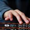 ITG Automotive engineer configuring SaaS deployment on device.