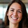 Samantha Owens, Project Lead at Clarity Consult, smiling in a meeting.
